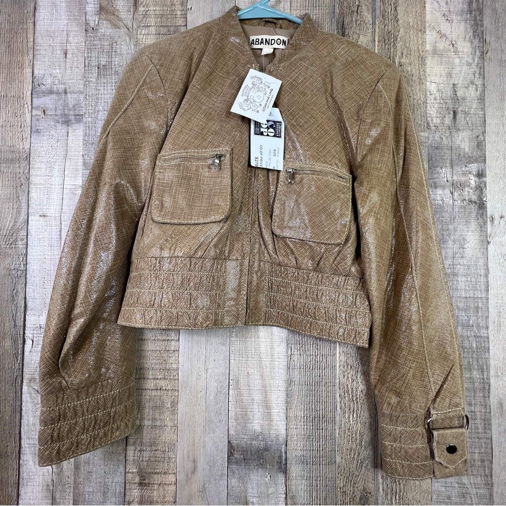 Abandon Size Medium Italian Shine Coated Leather In a Caramel Color w/Pockets